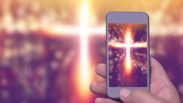 Lichtkreuz auf Smartphone