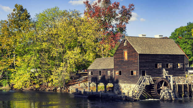 Haus mit einer Wassermühle