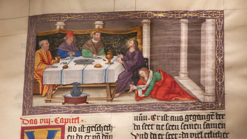 Orginalseite der bebilderten 'Ottheinrich-Bibel' zeigt 'Jesu Salbung durch die Sünderin', aus dem Lukasevangelium. Orginalseite der bebilderten 'Ottheinrich-Bibel' zeigt 'Jesu Salbung durch die Sünderin', aus dem Lukasevangelium.
