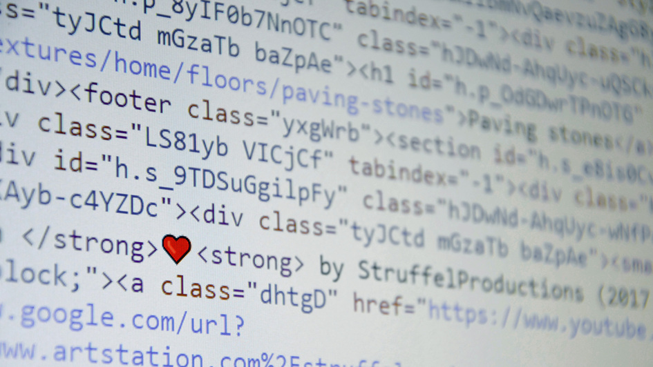 Programmiercode mit rotem Herzchen zwischen den Zeichen Programmiercode mit rotem Herzchen zwischen den Zeichen